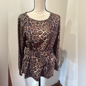 Leopard print Sterling Kreek size Med cheetah print top with peplum